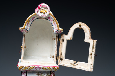 A polychrome French faience pocket watch holder, Marseille, 19th C.