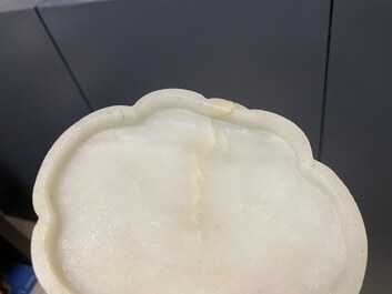 A Chinese wooden box with a white jade 'ruyi' plaque as cover, 18/19th C.