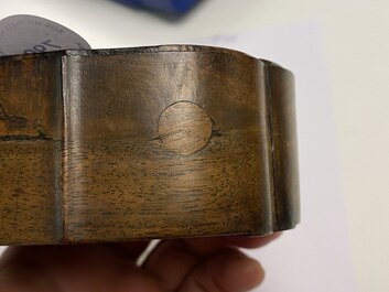 A Chinese wooden box with a white jade 'ruyi' plaque as cover, 18/19th C.