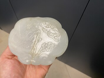 A Chinese wooden box with a white jade 'ruyi' plaque as cover, 18/19th C.