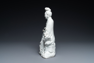 A Chinese Dehua blanc de Chine figure of Guanyin, impressed mark, 19/20th C.