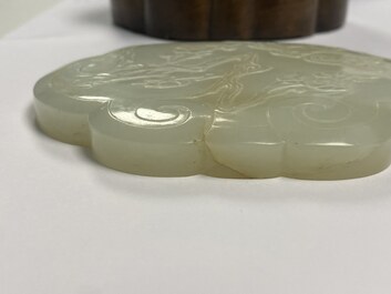 A Chinese wooden box with a white jade 'ruyi' plaque as cover, 18/19th C.