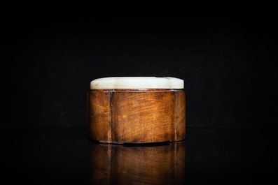 A Chinese wooden box with a white jade 'ruyi' plaque as cover, 18/19th C.