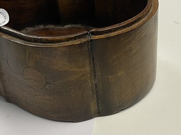 A Chinese wooden box with a white jade 'ruyi' plaque as cover, 18/19th C.