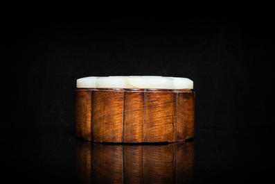 A Chinese wooden box with a white jade 'ruyi' plaque as cover, 18/19th C.