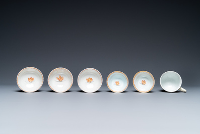 A varied collection of Chinese famille rose and grisaille cups and saucers and a 'rooster' bowl, Yongzheng/Qianlong