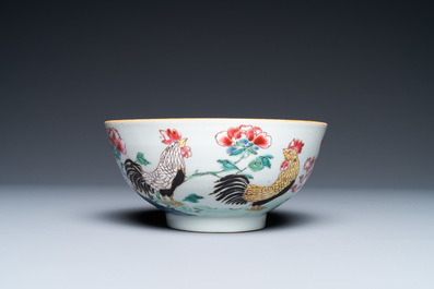 A varied collection of Chinese famille rose and grisaille cups and saucers and a 'rooster' bowl, Yongzheng/Qianlong