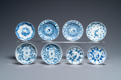 Nineteen Chinese blue and white saucers and twelve cups, Kangxi