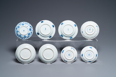 Nineteen Chinese blue and white saucers and twelve cups, Kangxi
