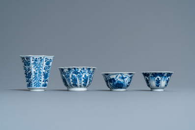 Twenty-one Chinese blue and white saucers and eighteen cups, Kangxi