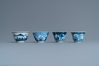 Twenty-one Chinese blue and white saucers and eighteen cups, Kangxi