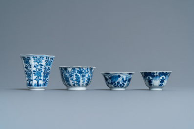 Twenty-one Chinese blue and white saucers and eighteen cups, Kangxi