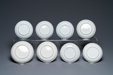 A varied collection of Chinese famille rose and grisaille cups and saucers and a 'rooster' bowl, Yongzheng/Qianlong