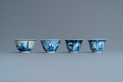 Twenty-one Chinese blue and white saucers and eighteen cups, Kangxi