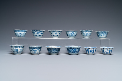 Nineteen Chinese blue and white saucers and twelve cups, Kangxi