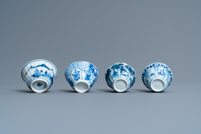 Twenty-one Chinese blue and white saucers and eighteen cups, Kangxi