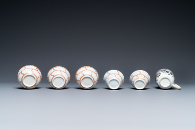 A varied collection of Chinese famille rose and grisaille cups and saucers and a 'rooster' bowl, Yongzheng/Qianlong