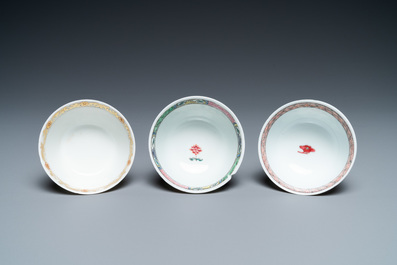 Five Chinese famille rose and grisaille saucers and three cups, Yongzheng
