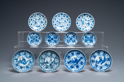 Nineteen Chinese blue and white saucers and twelve cups, Kangxi