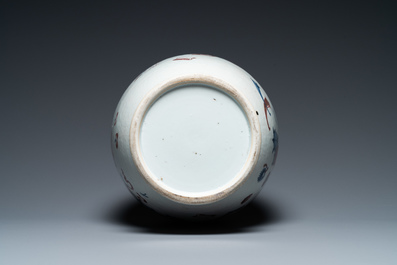A Chinese blue, white and copper red 'antiquities' bottle vase, Qianlong