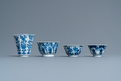 Twenty-one Chinese blue and white saucers and eighteen cups, Kangxi