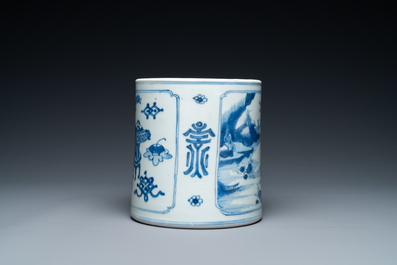 A Chinese blue and white brush pot with a landscape and antiquities, Kangxi
