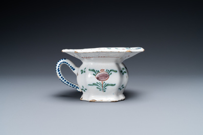 A polychrome Dutch Delft spittoon, 18th C.