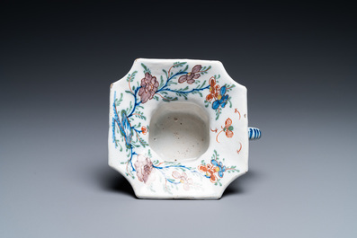A polychrome Dutch Delft spittoon, 18th C.