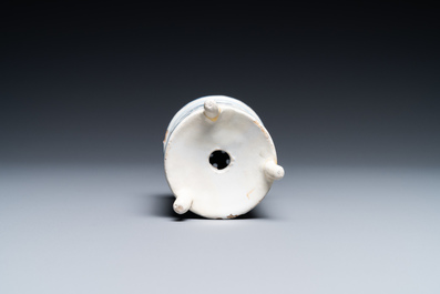 A Dutch Delft blue and white tripod caster with birds near blossoms, 1st half 18th C.
