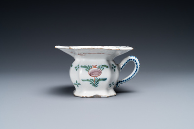 A polychrome Dutch Delft spittoon, 18th C.