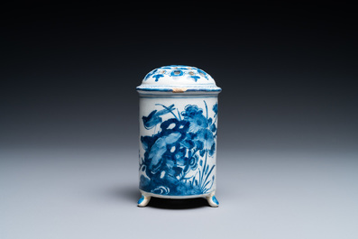 A Dutch Delft blue and white tripod caster with birds near blossoms, 1st half 18th C.