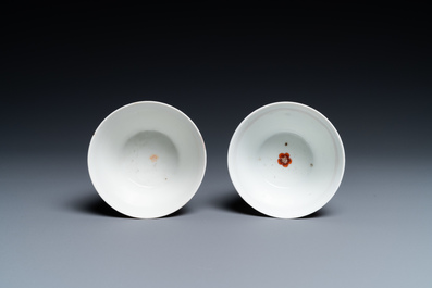 A pair of Chinese famille rose cups and saucers with aquatic birds, Qianlong