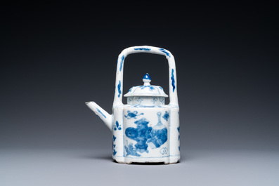 A Chinese blue and white arch-handled teapot and cover, Kangxi