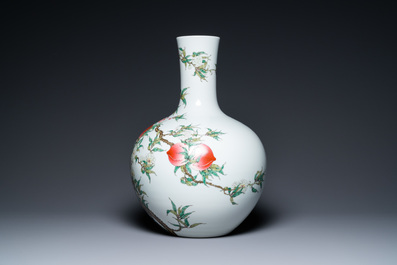 A Chinese famille rose 'nine peaches' tianqiu ping vase, Qianlong mark, 20th C.