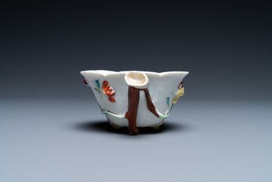 A Chinese famille rose relief-decorated libation cup, Yongzheng