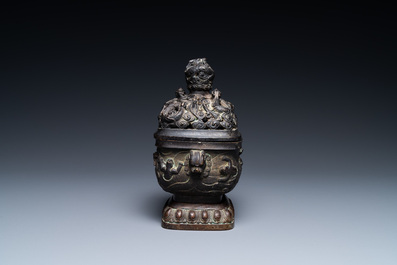 A Chinese bronze 'mythical beasts' censer and cover, 17th C.