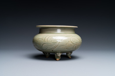 A Chinese Yaozhou celadon tripod censer, Song or later