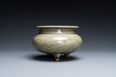 A Chinese Yaozhou celadon tripod censer, Song or later