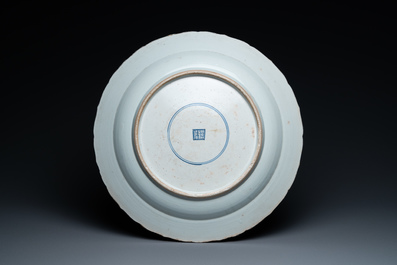 A Chinese famille verte dish with a kissing couple in a boat, Kangxi