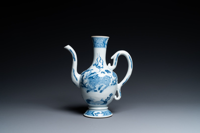 A Chinese blue and white 'qilin and phoenix' ewer, Kangxi