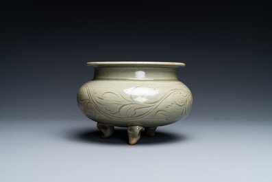 A Chinese Yaozhou celadon tripod censer, Song or later
