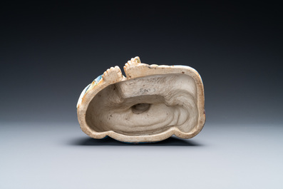 Une figure de Bouddha en porcelaine de Chine famille rose, marque Xue Chang Sen Zuo, R&eacute;publique
