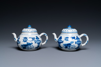 A pair of Chinese blue and white 'antiquities' teapots, Kangxi