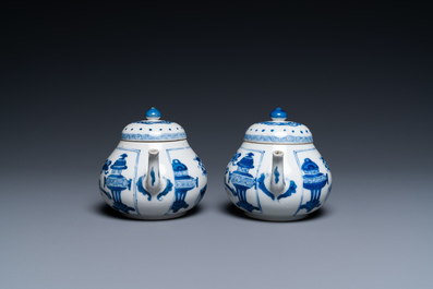A pair of Chinese blue and white 'antiquities' teapots, Kangxi