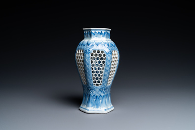 A Chinese reticulated double-walled blue and white vase, Kangxi