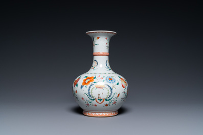 A Chinese famille rose 'Pompadour' kendi, Yongzheng/Qianlong