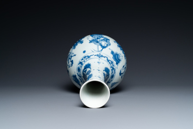 A Chinese blue and white bottle vase depicting four figures, Transitional period