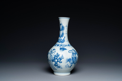 A Chinese blue and white bottle vase depicting four figures, Transitional period