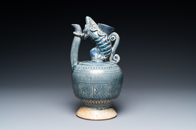 A very rare Vietnamese or Annamese blue-glazed 'shrimp' ewer, 15/16th C.