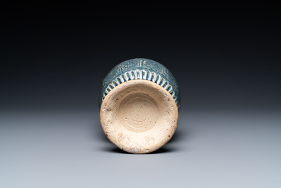 A very rare Vietnamese or Annamese blue-glazed 'shrimp' ewer, 15/16th C.